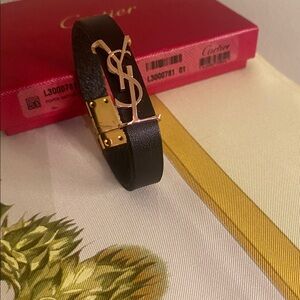 Auth Yves Saint Laurent Black and Gold Bracelet